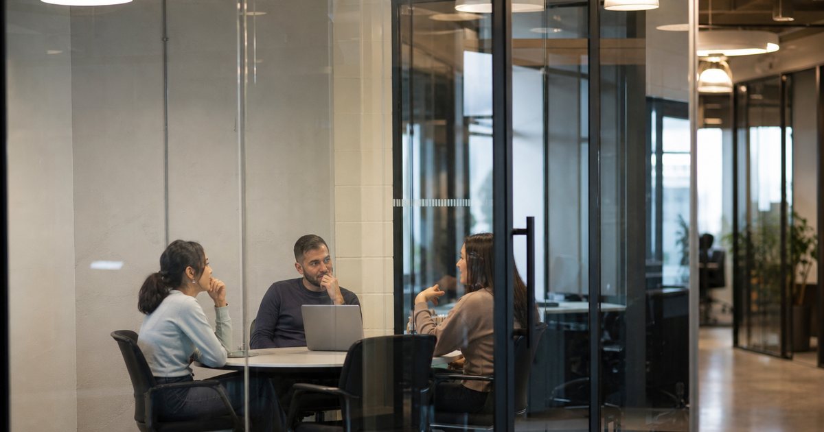 Why do meeting room credits help coworking spaces manage limited shared space?