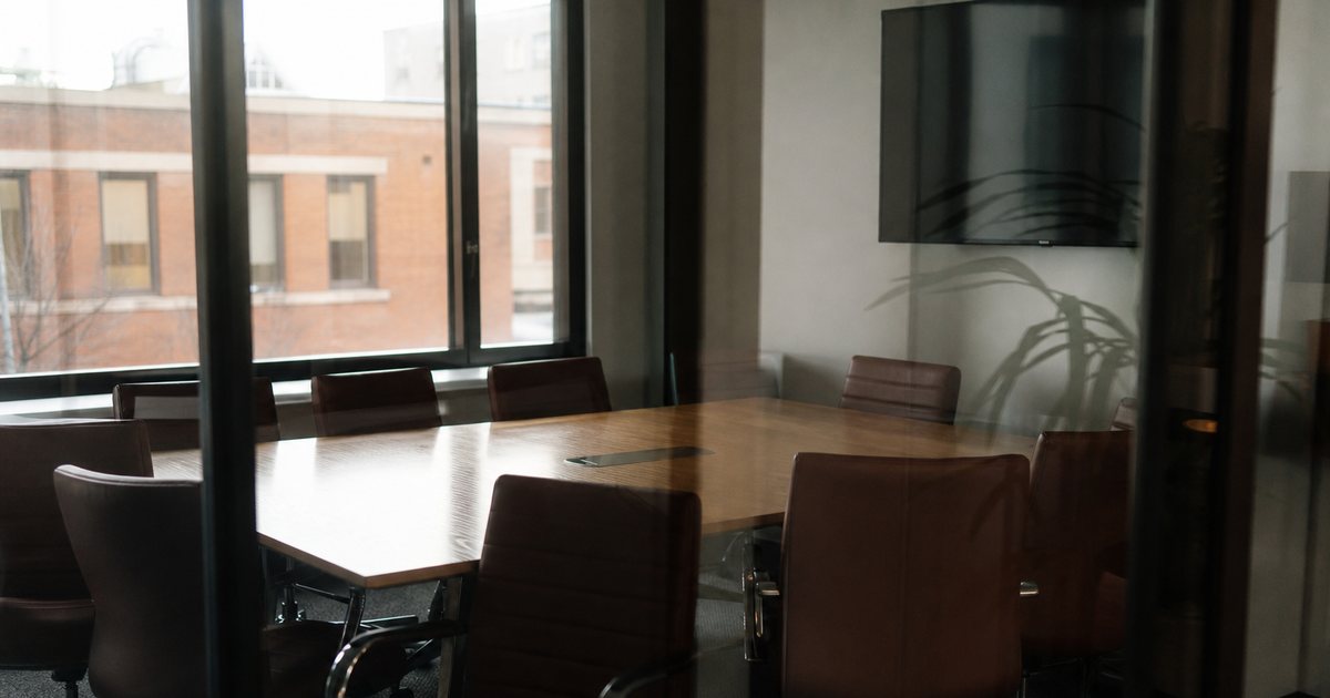 How can coworking spaces reduce no-shows for reserved meeting rooms and desks?
